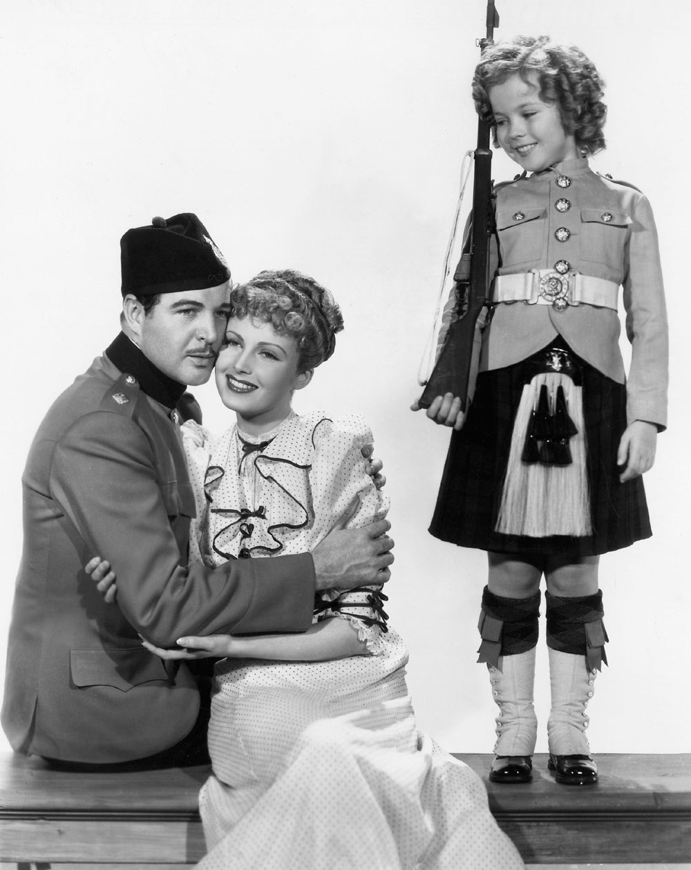 Michael Whalen, June Lang, Shirley Temple in Wee Willie Winkie